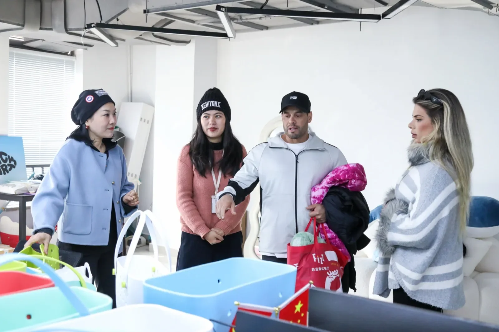 Overseas buyers reviewing bag samples at our Yiwu showroom